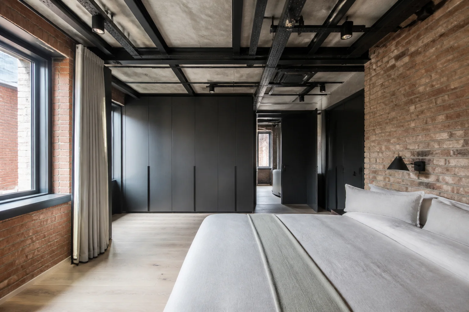 A Industrial primary bedroom remodel